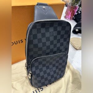 Authentic Louis Vuitton Damier Graphite Avenue Sling Backpack. Brand New